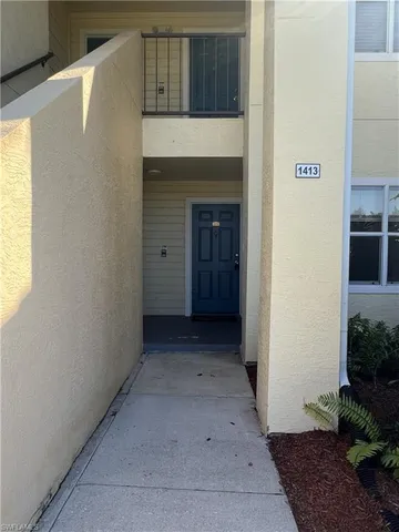 a view of a hallway with entryway