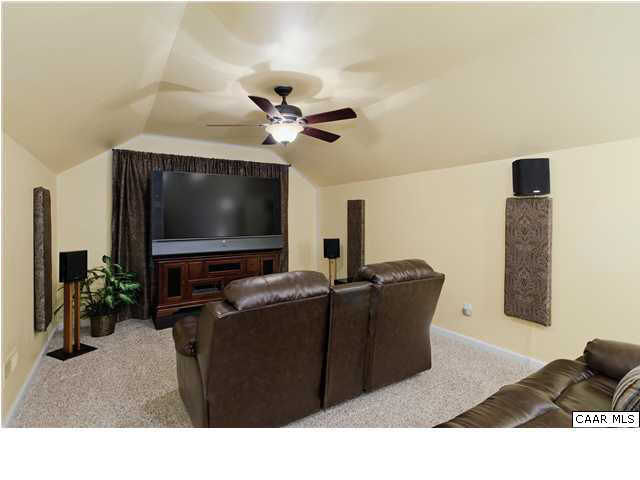 3771 Ashleigh Way Road Barboursville, VA 22923 - Photo 23 of 26 Bedroom #4 is currently being used as a media/theater room. This room could be a guest suite as it has a large closet with rough-in plumbing for a full bath.