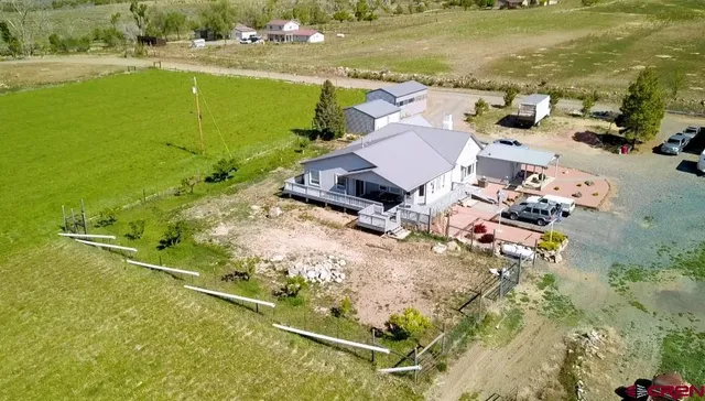 an aerial view of ocean residential houses with outdoor space