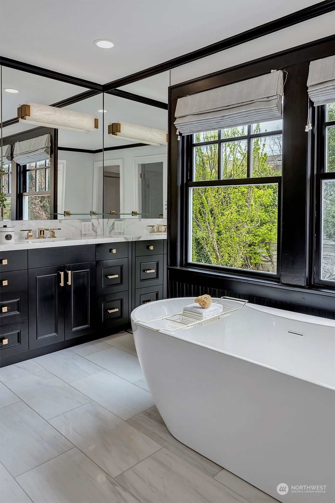 3422 Hunter Boulevard South Seattle, WA 98144 - Photo 27 of 40 a spacious bathroom with a large tub and double vanity
