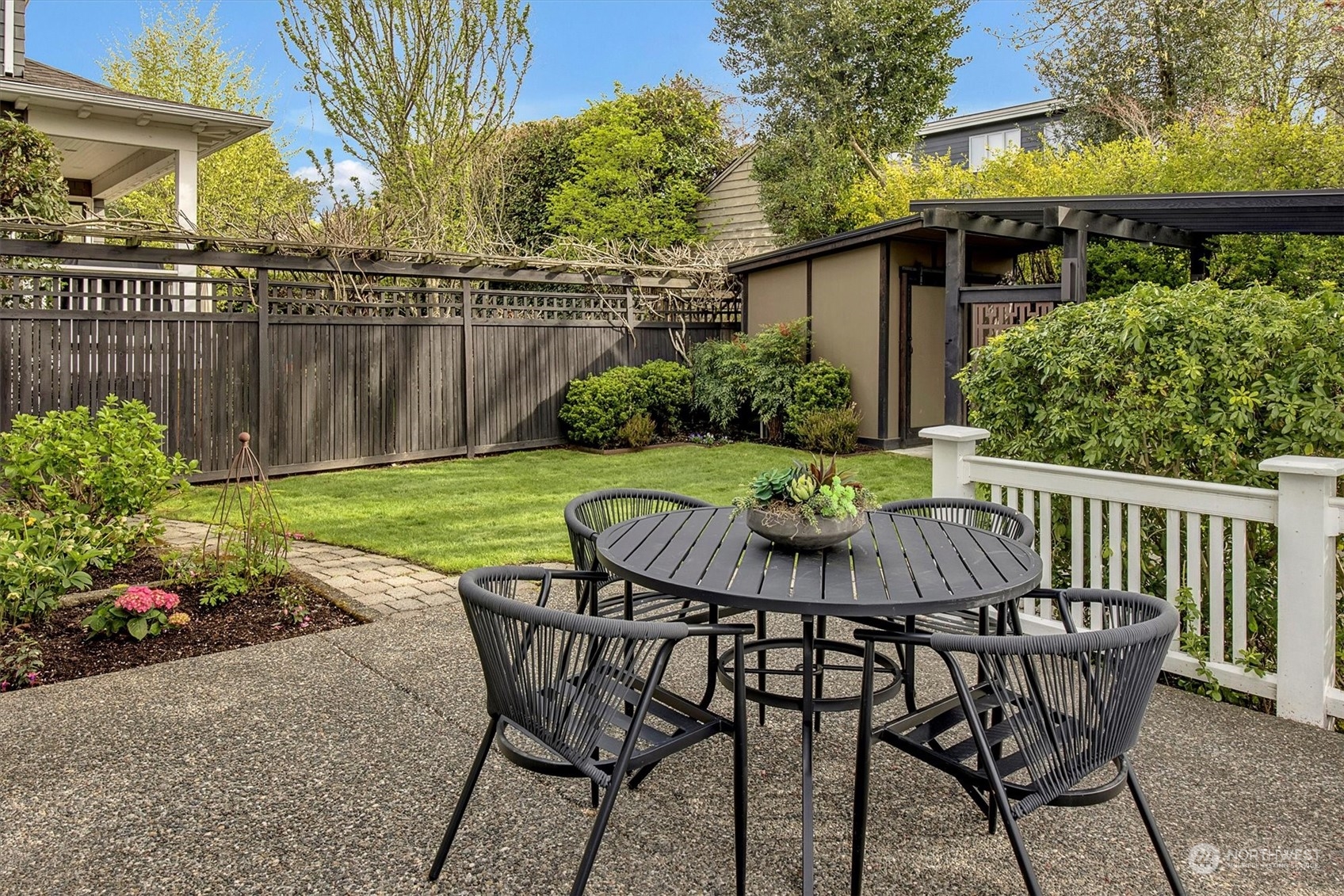3422 Hunter Boulevard South Seattle, WA 98144 - Photo 34 of 40 a view of a chair and table in backyard of the house