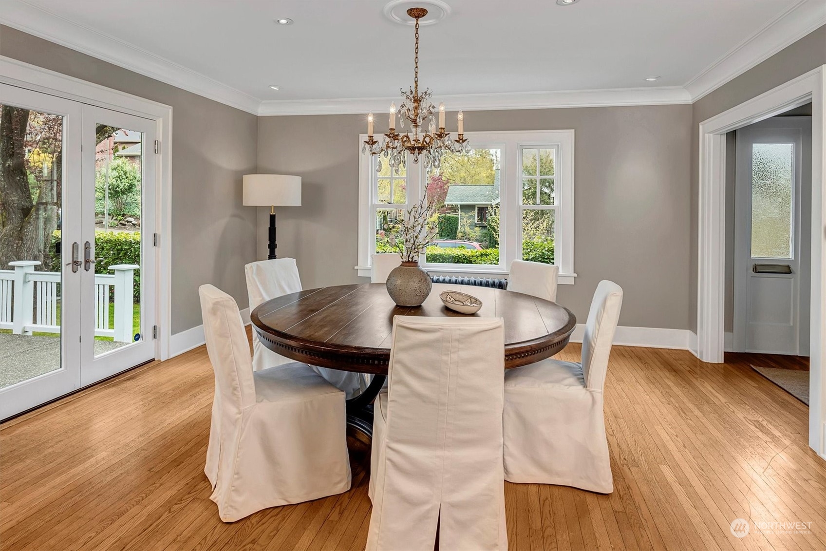 3422 Hunter Boulevard South Seattle, WA 98144 - Photo 10 of 40 a view of a dining room with furniture a chandelier and wooden floor