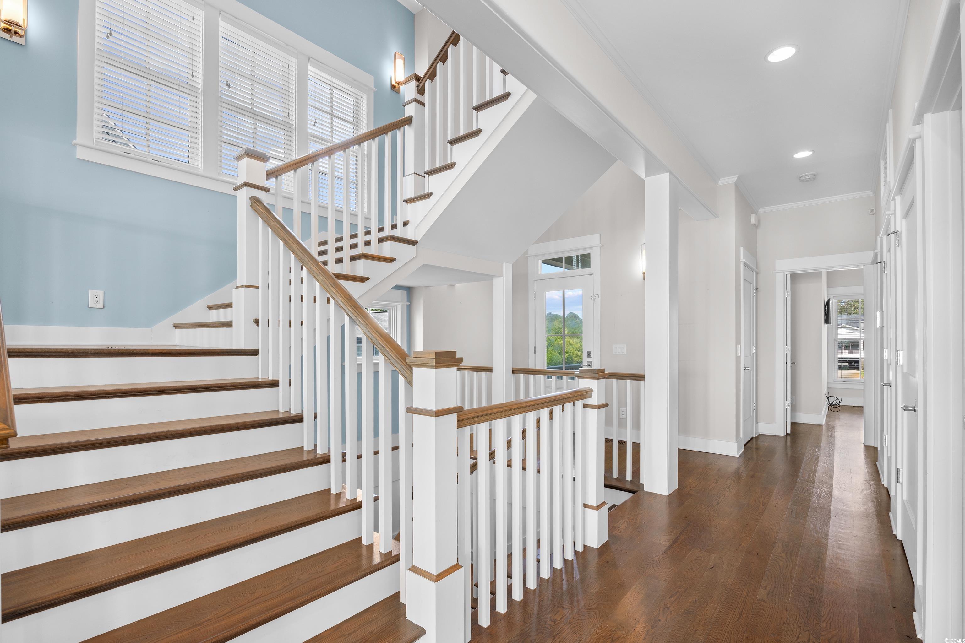 40 Seaview Loop Pawleys Island, SC 29585 - Photo 17 of 34 Staircase featuring wood finished floors, recessed lighting, and ornamental molding