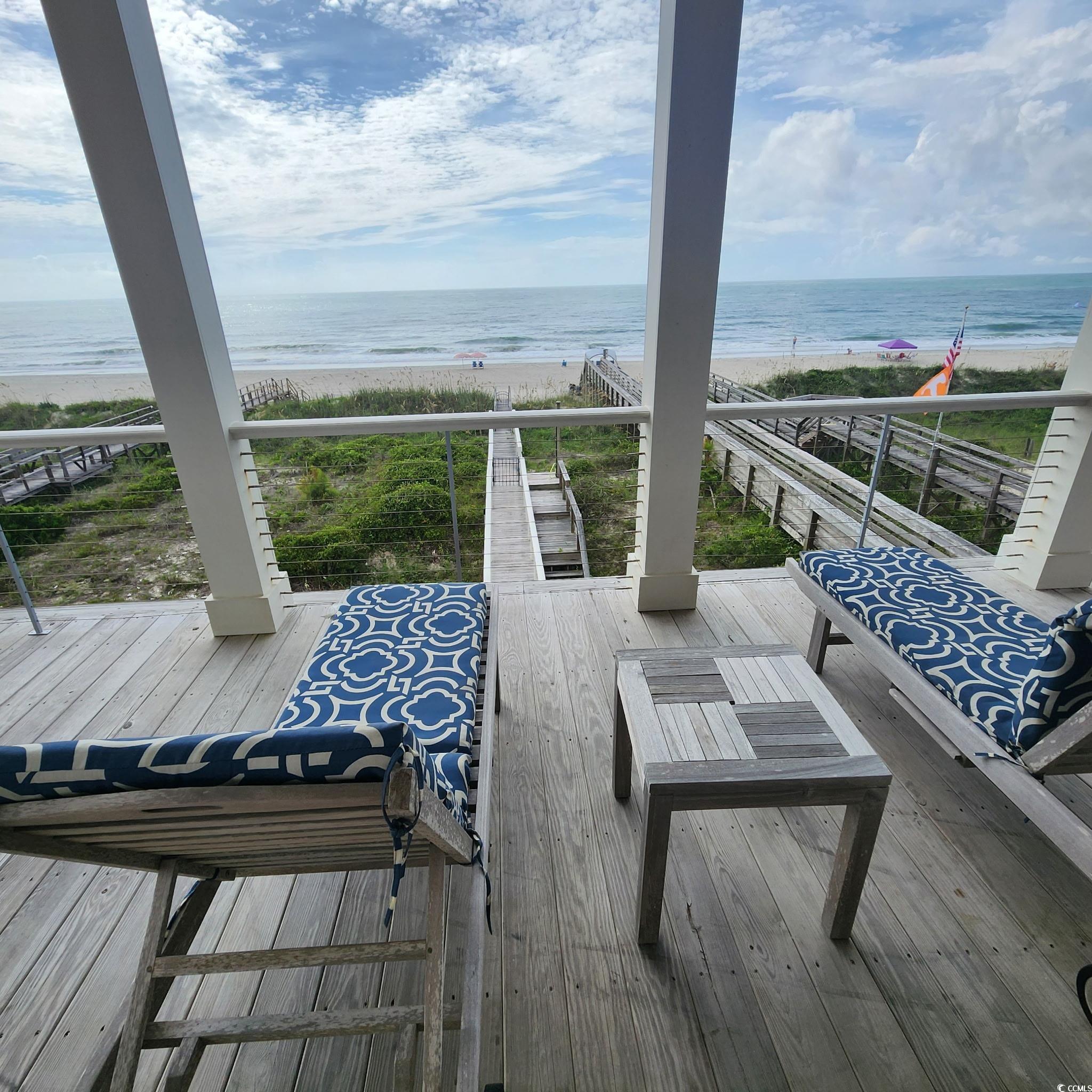 40 Seaview Loop Pawleys Island, SC 29585 - Photo 23 of 34 Wooden terrace featuring view of water and beach
