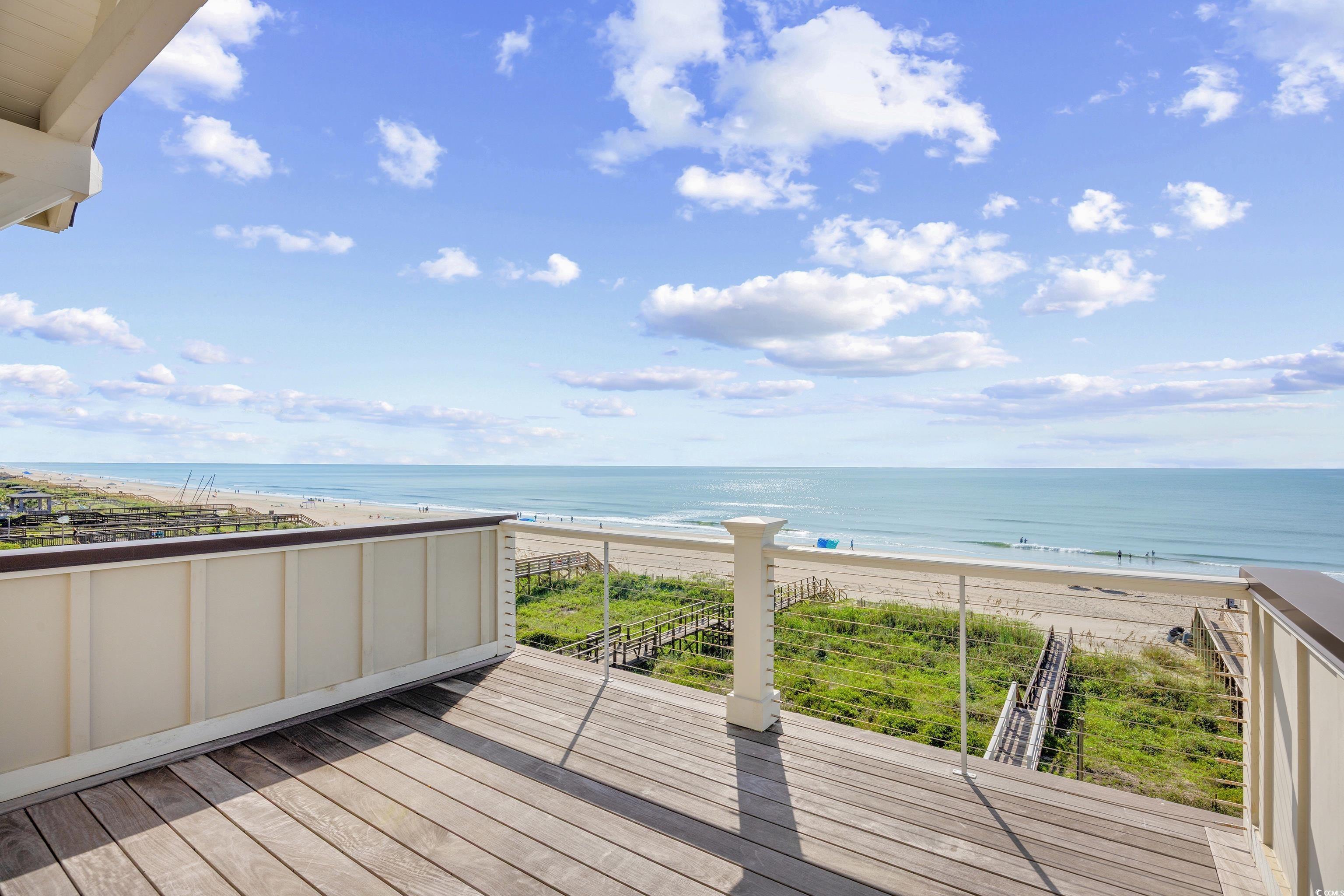 40 Seaview Loop Pawleys Island, SC 29585 - Photo 24 of 34 Wooden terrace with view of water and beach