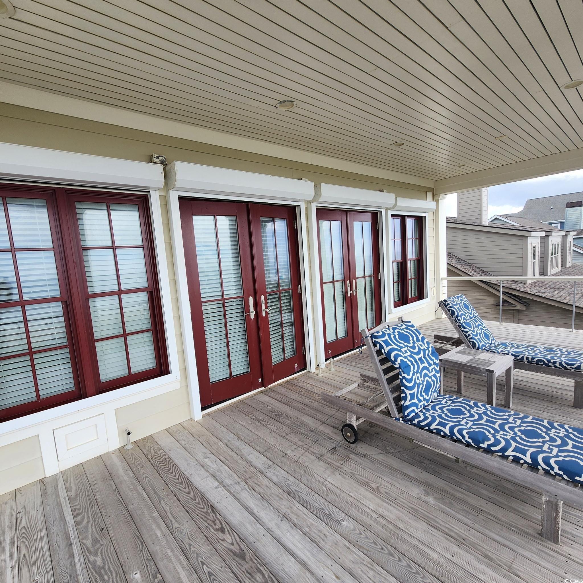 40 Seaview Loop Pawleys Island, SC 29585 - Photo 27 of 34 Wooden terrace with french doors