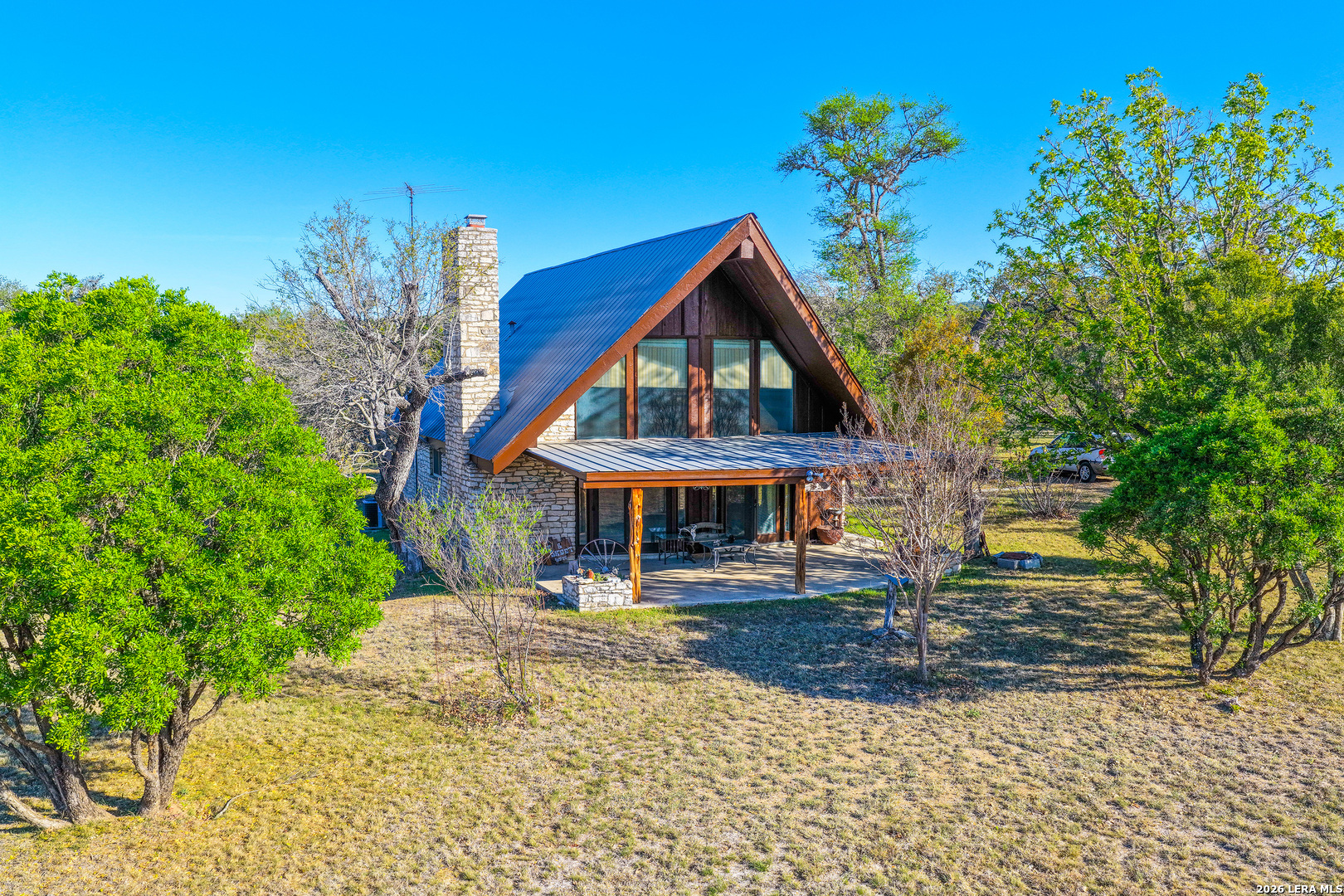 348 Rocky Road Pipe Creek, TX 78063 - Photo 1 of 41 a view of a house with entertaining space