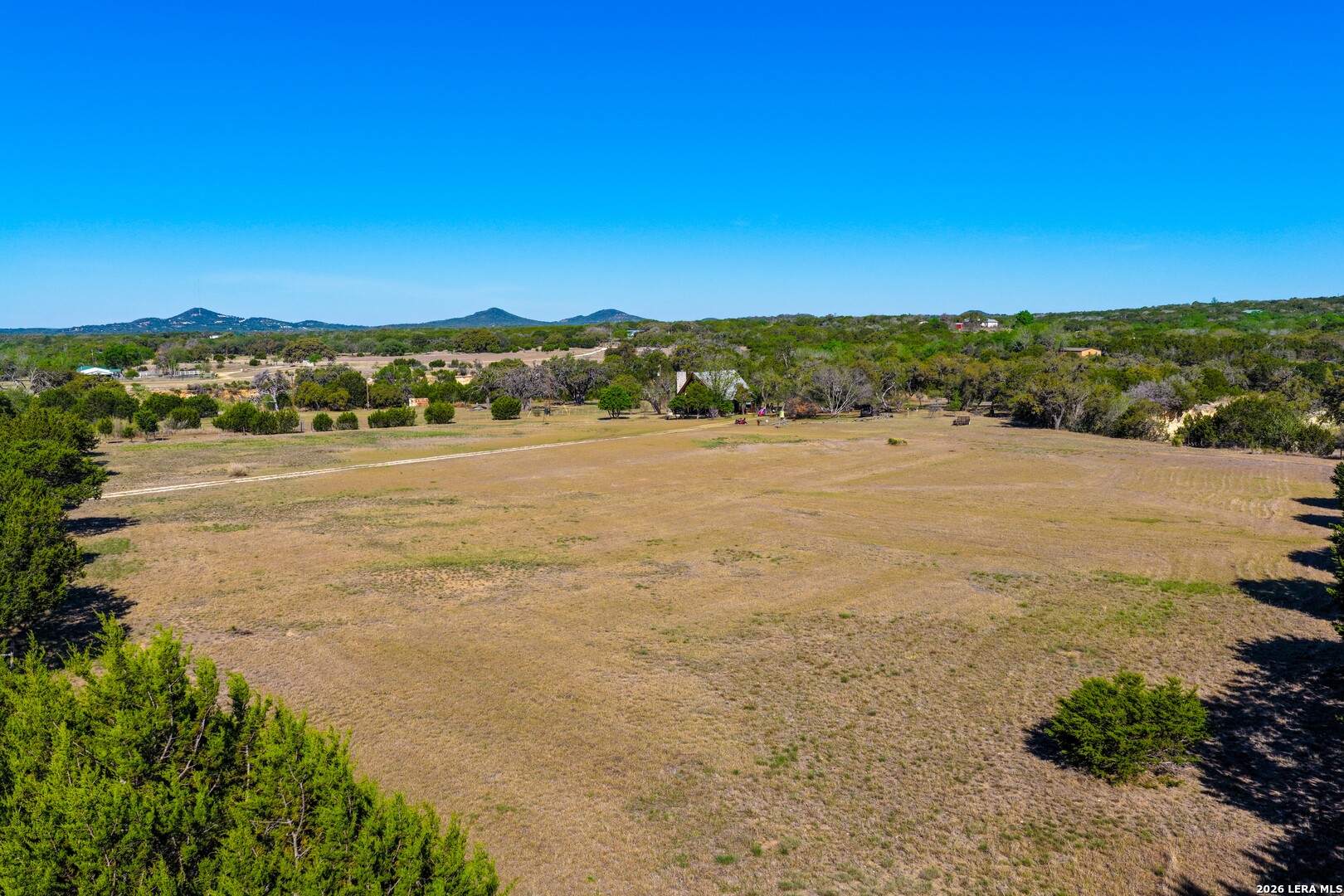 348 Rocky Road Pipe Creek, TX 78063 - Photo 8 of 41 a view of an ocean beach and mountain