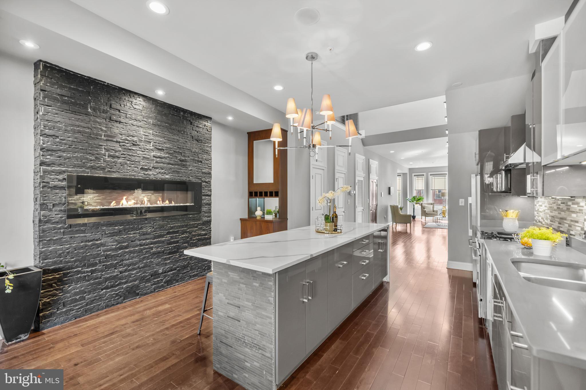 151 V Street Northwest, Unit 4 Washington, DC 20001 - Photo 15 of 49 a large kitchen with a chandelier