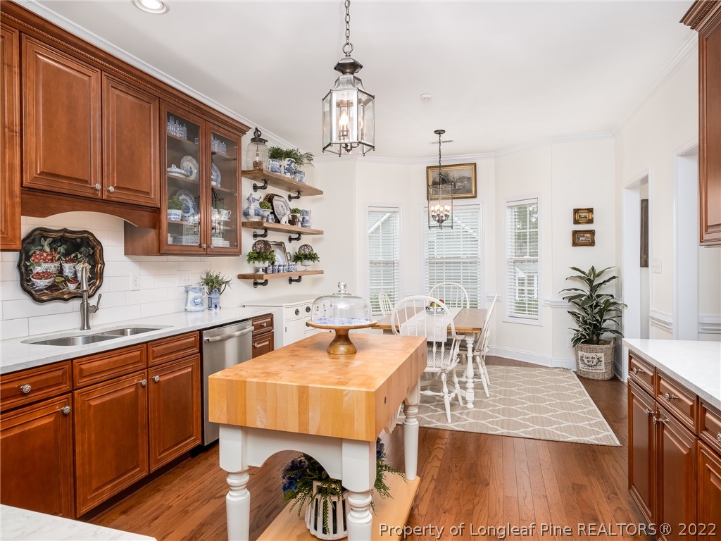 320 Porlock Way Raeford, NC 28376 - Photo 17 of 41 a view of a dining room with furniture window and wooden floor