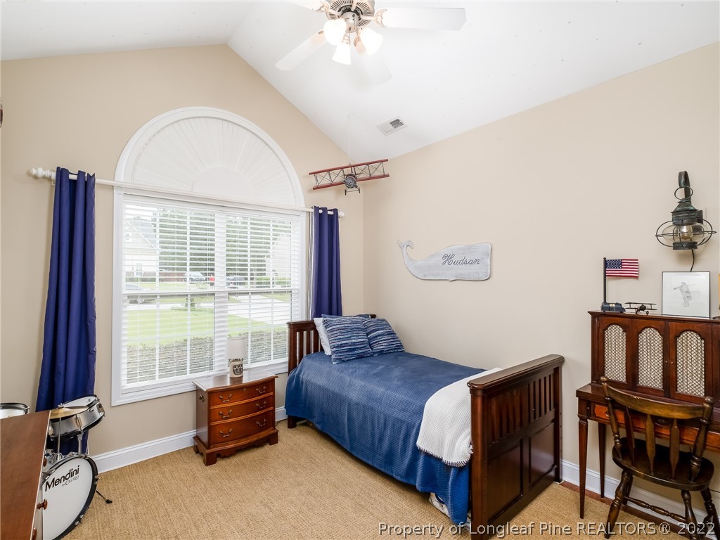 320 Porlock Way Raeford, NC 28376 - Photo 28 of 41 a bedroom with furniture and a window