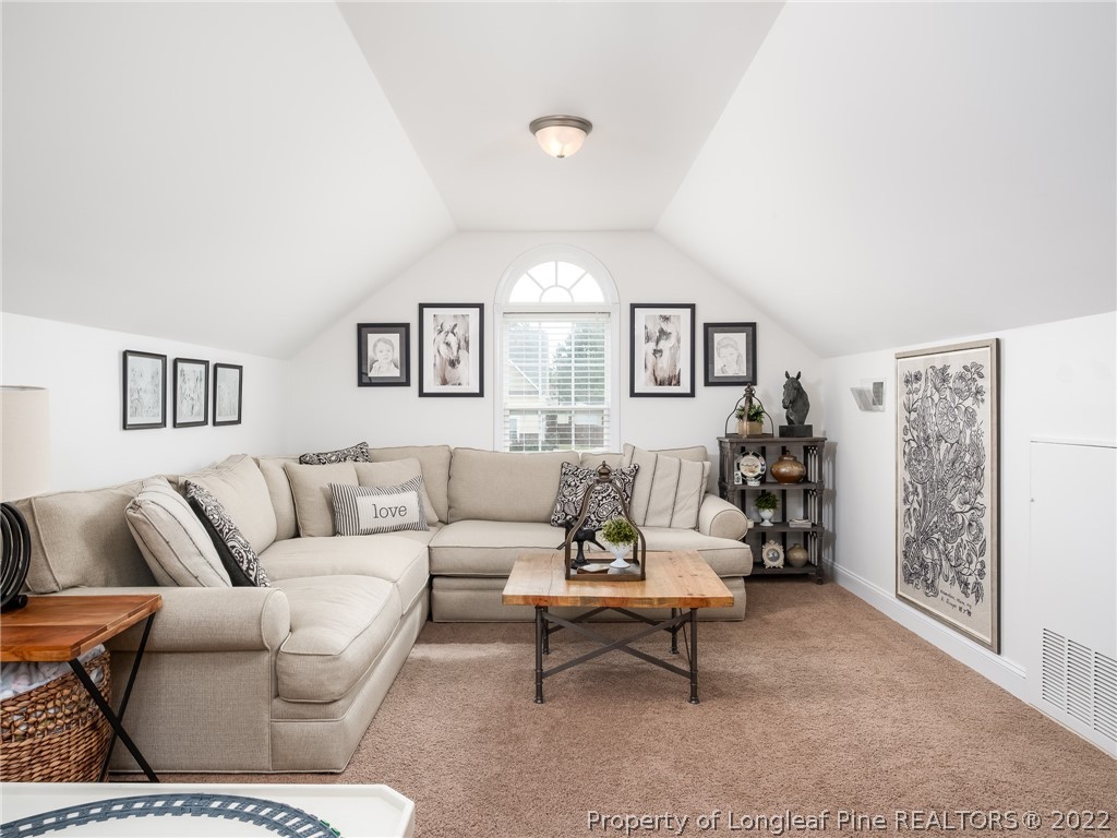 320 Porlock Way Raeford, NC 28376 - Photo 30 of 41 a living room with furniture and a large window