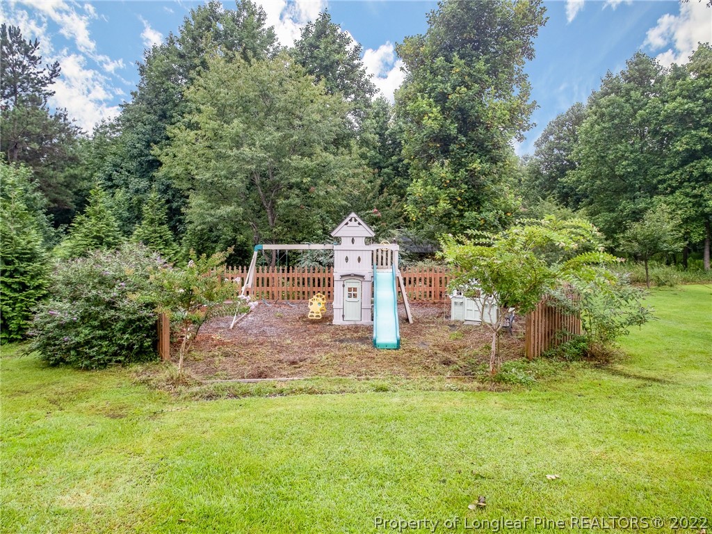 320 Porlock Way Raeford, NC 28376 - Photo 33 of 41 a house view with a garden space