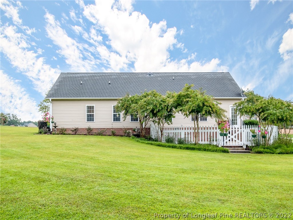 320 Porlock Way Raeford, NC 28376 - Photo 35 of 41 a front view of a house with garden