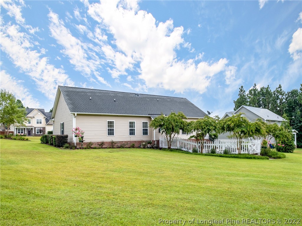 320 Porlock Way Raeford, NC 28376 - Photo 36 of 41 a view of a house with a yard patio and swimming pool