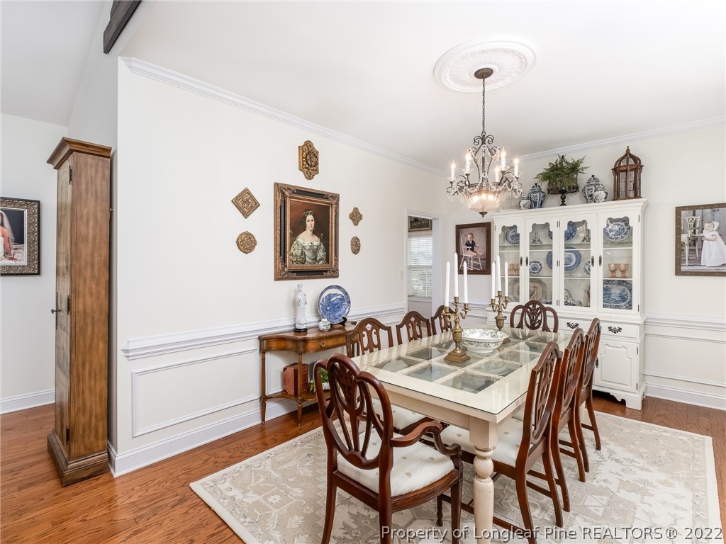 320 Porlock Way Raeford, NC 28376 - Photo 6 of 41 a view of a dining room with furniture and wooden floor