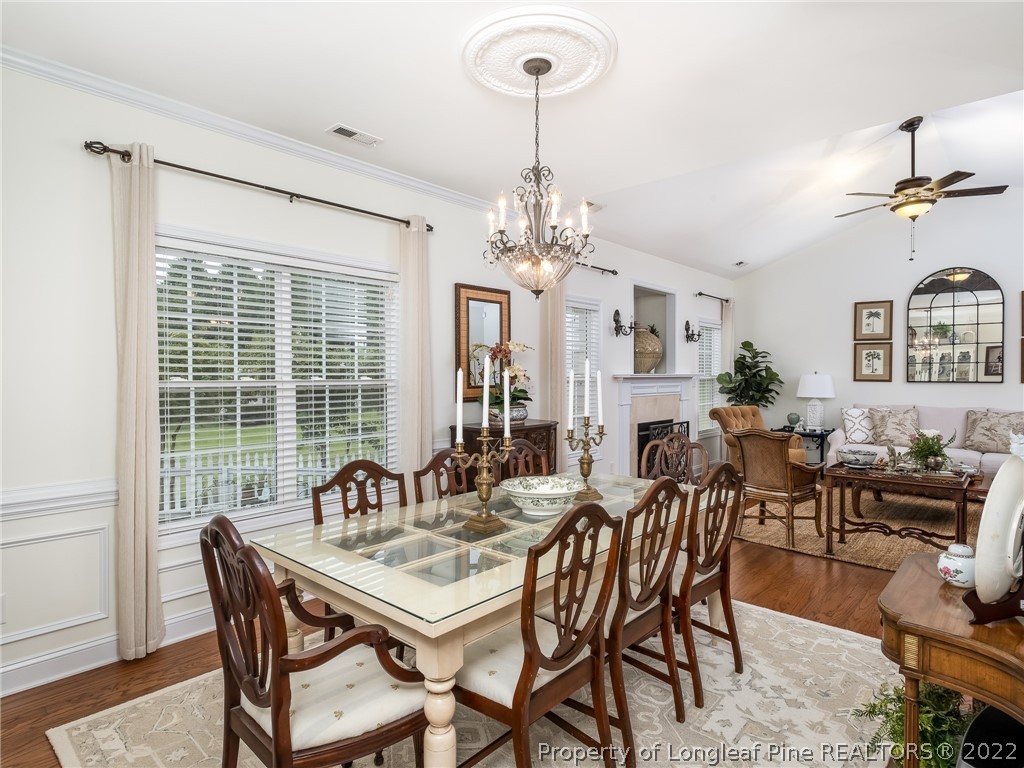 320 Porlock Way Raeford, NC 28376 - Photo 7 of 41 a view of a dining room with furniture window and outside view
