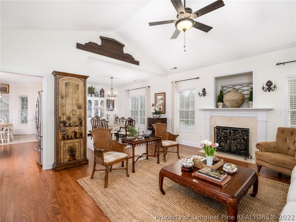 320 Porlock Way Raeford, NC 28376 - Photo 8 of 41 a living room with furniture and a fireplace