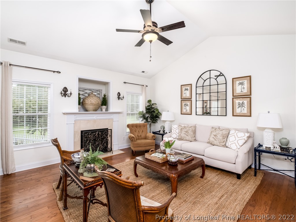 320 Porlock Way Raeford, NC 28376 - Photo 10 of 41 a living room with furniture fireplace and a window