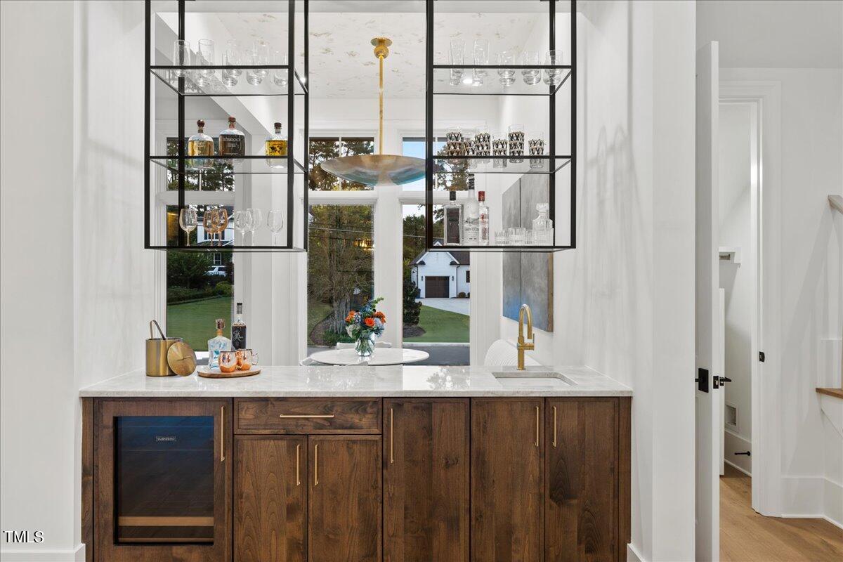 222 Reynolds Road Raleigh, NC 27609 - Photo 11 of 43 a bathroom with a sink and a mirror