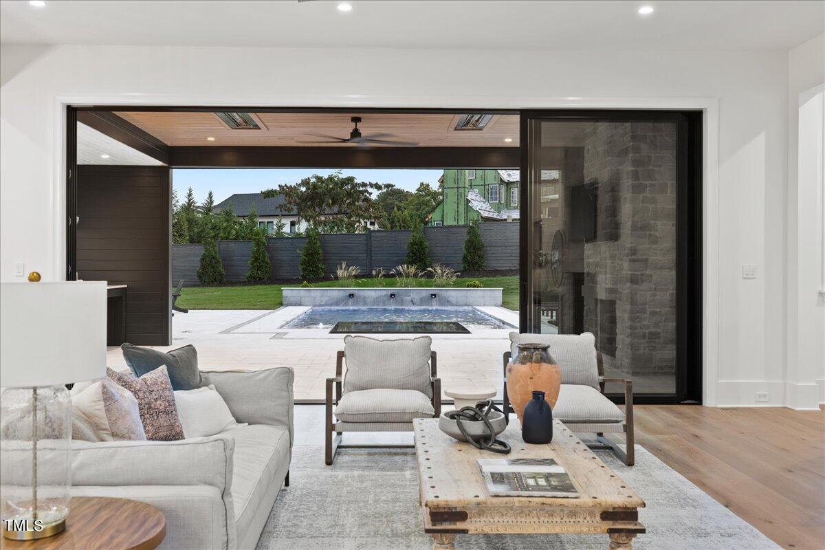 222 Reynolds Road Raleigh, NC 27609 - Photo 18 of 43 a living room with furniture and a large window