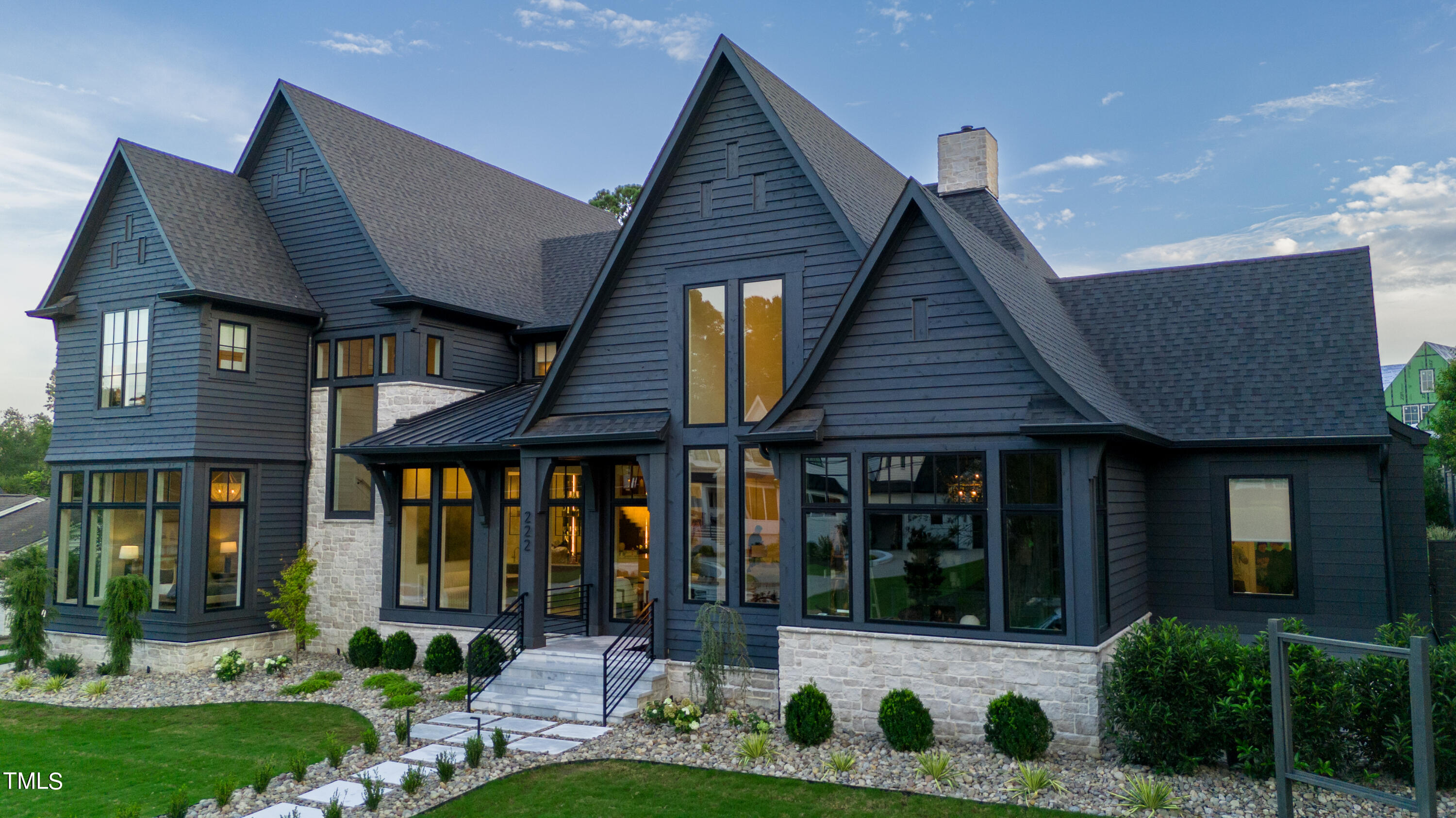 222 Reynolds Road Raleigh, NC 27609 - Photo 2 of 43 a front view of house with yard and outdoor seating