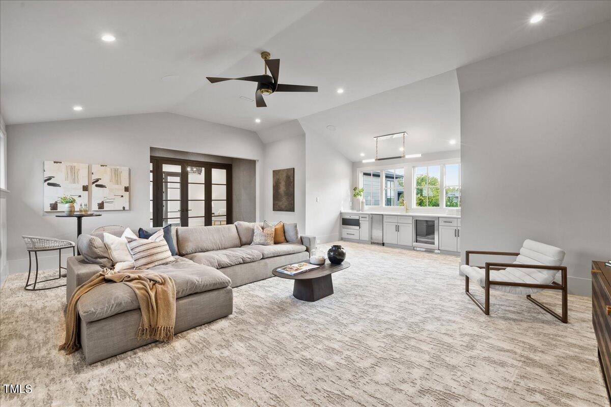 222 Reynolds Road Raleigh, NC 27609 - Photo 24 of 43 a living room with furniture and a large window