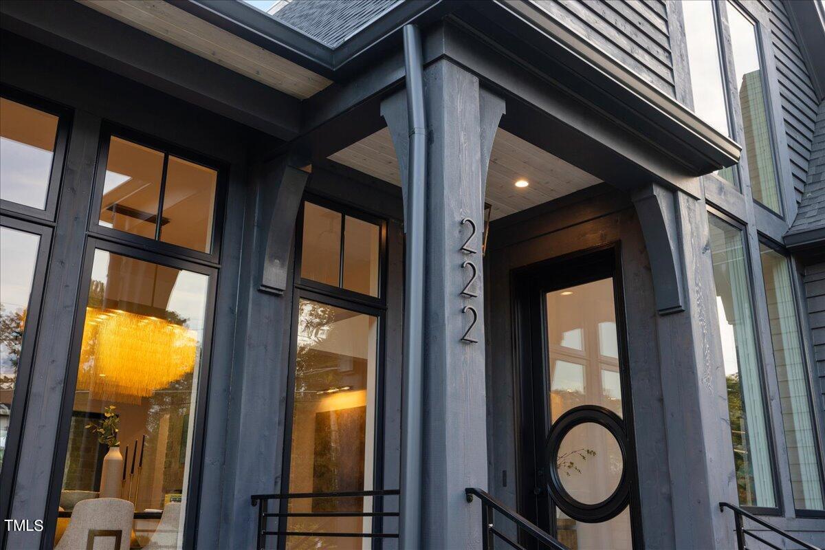 222 Reynolds Road Raleigh, NC 27609 - Photo 3 of 43 a view of living room with washer and dryer