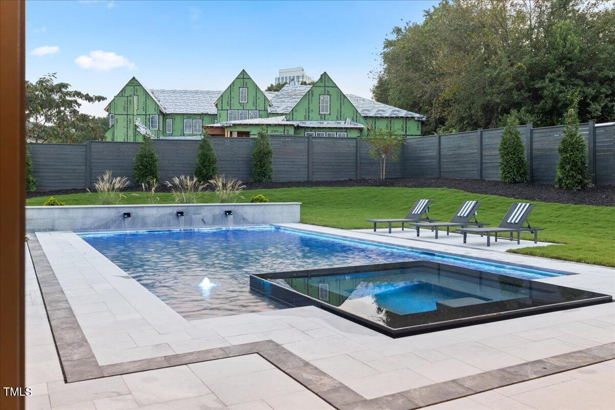 222 Reynolds Road Raleigh, NC 27609 - Photo 41 of 43 a front view of a house with garden