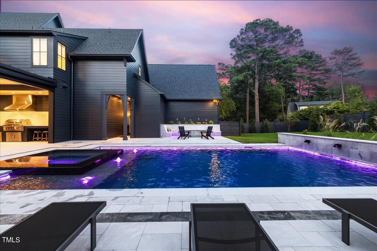 222 Reynolds Road Raleigh, NC 27609 - Photo 5 of 43 a view of outdoor space with swimming pool and furniture