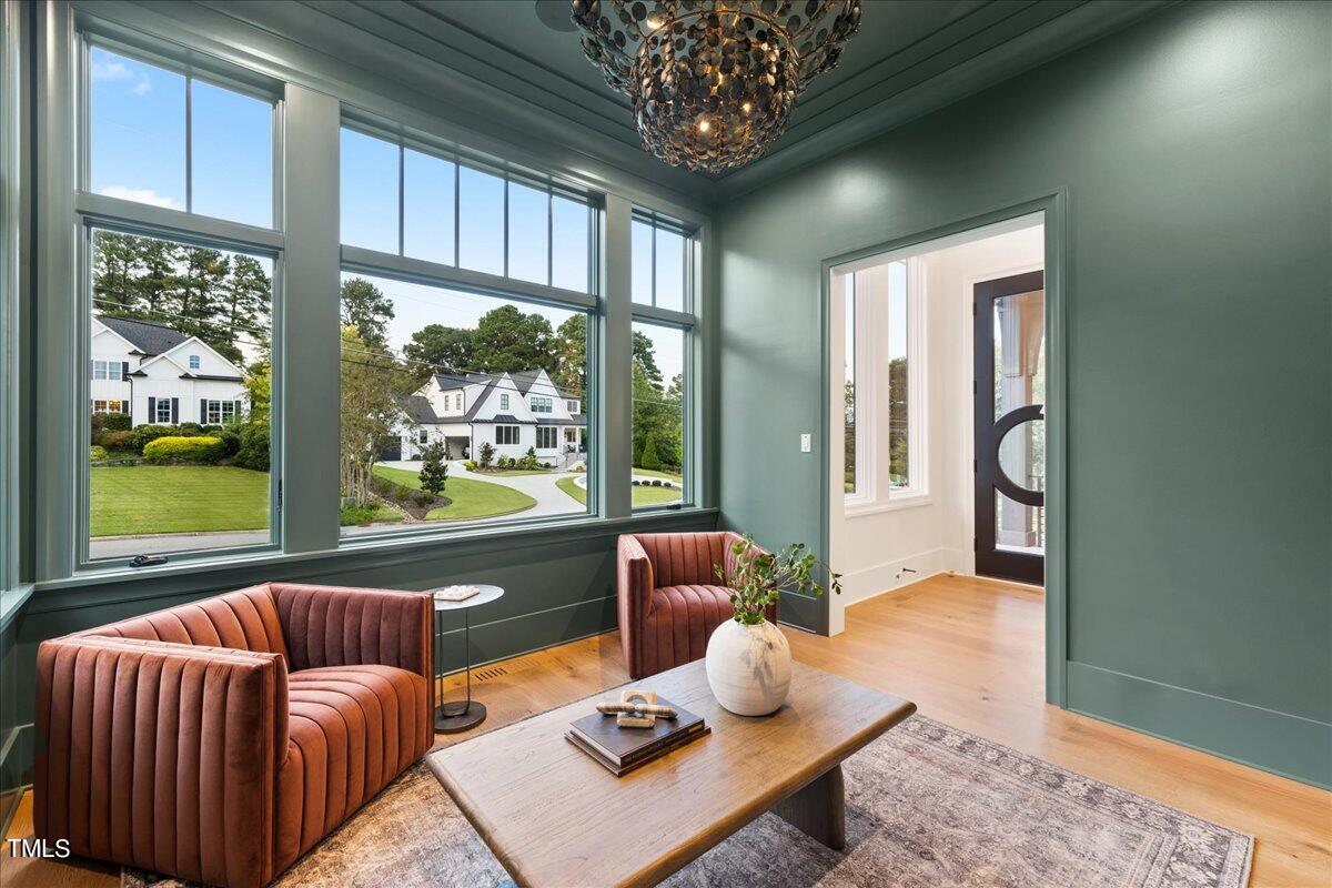 222 Reynolds Road Raleigh, NC 27609 - Photo 8 of 43 a living room with furniture and a large window