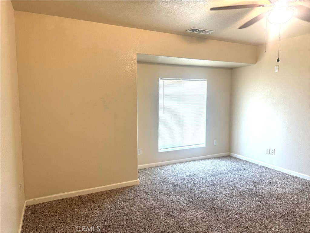 1339 Playa Del Rey Drive Merced, CA 95348 - Photo 23 of 48 an empty room with a windows and closet