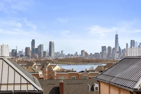 a view of a city with tall buildings