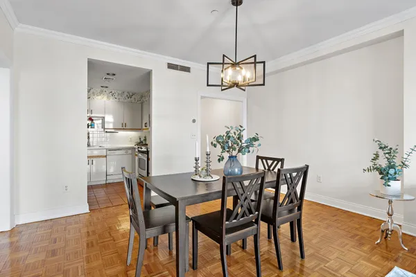 a kitchen with stainless steel appliances granite countertop a sink and a stove