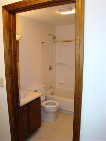 512-514 Gleasondale Road Stow, MA 01775 - Photo 12 of 16 a bathroom with a sink a toilet and shower