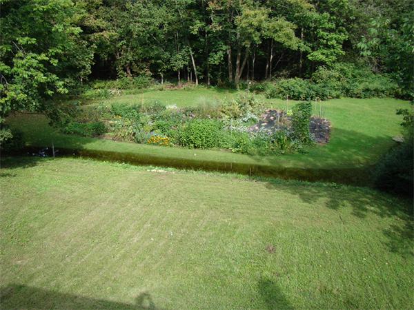 512-514 Gleasondale Road Stow, MA 01775 - Photo 15 of 16 a view of outdoor space with a garden