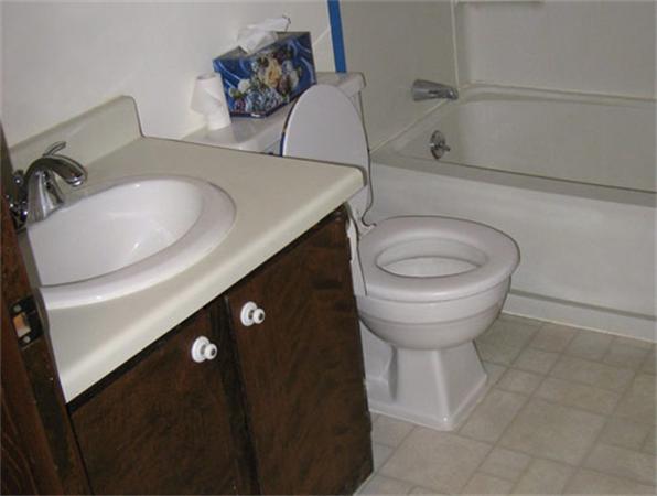 512-514 Gleasondale Road Stow, MA 01775 - Photo 7 of 16 a bathroom with a sink and a toilet