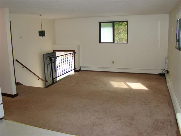 512-514 Gleasondale Road Stow, MA 01775 - Photo 10 of 16 a view of empty room with window