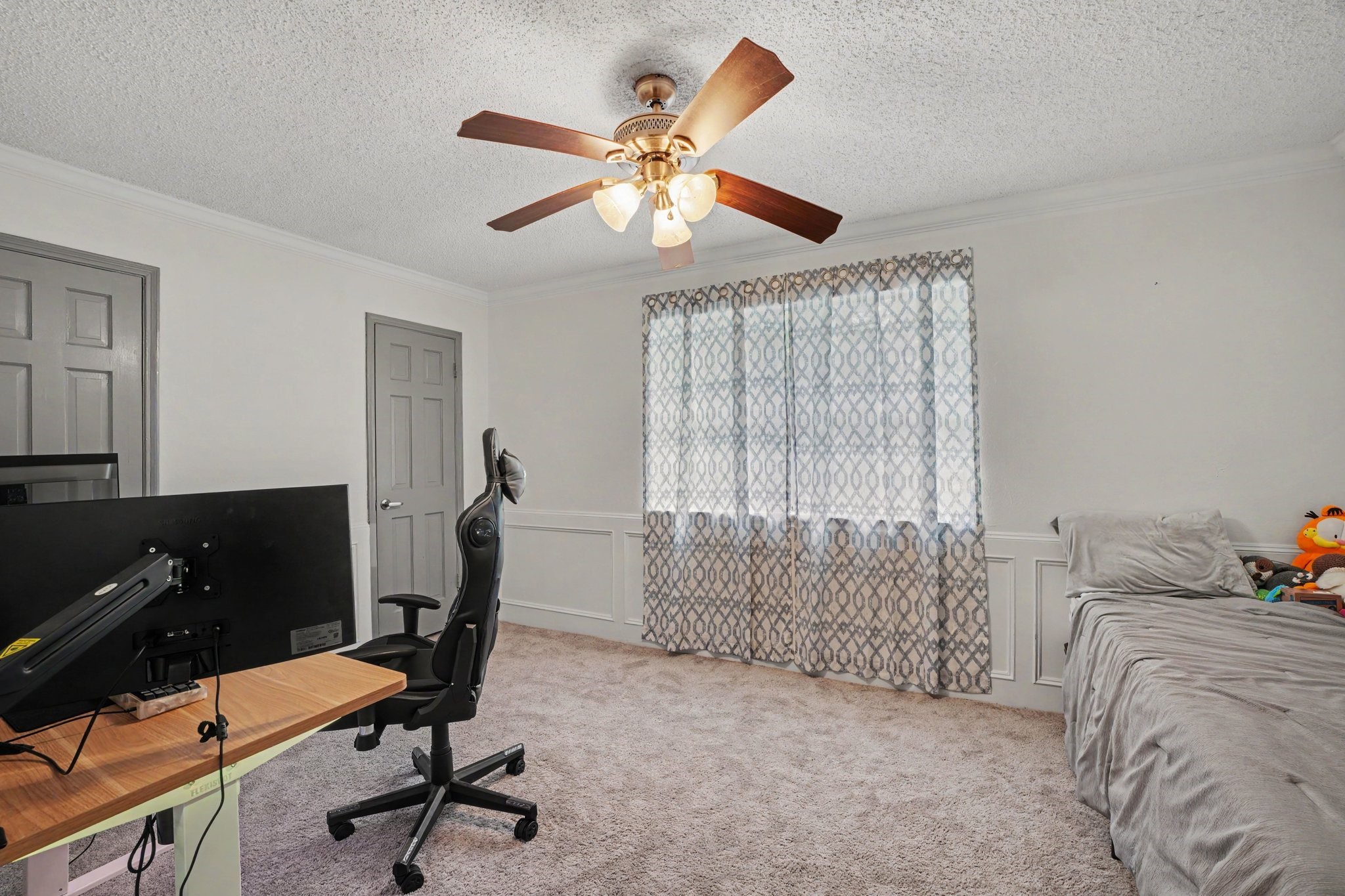 9530 Arcade Drive Spring, TX 77379 - Photo 18 of 32 Generously sized upstairs secondary bedroom with dual closets.