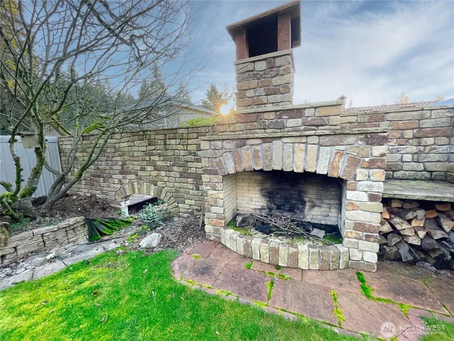 a aerial view of a house with a yard