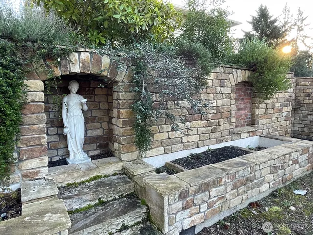a front view of a house with outdoor space