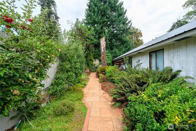a view of a pathway in a garden