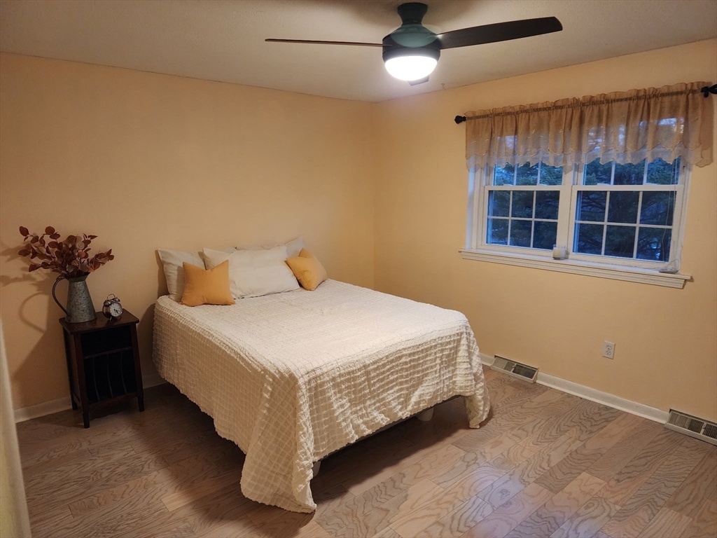 20 Hemlock Circle, Unit 20 Millis, MA 02054 - Photo 14 of 24 a bedroom with a bed and window