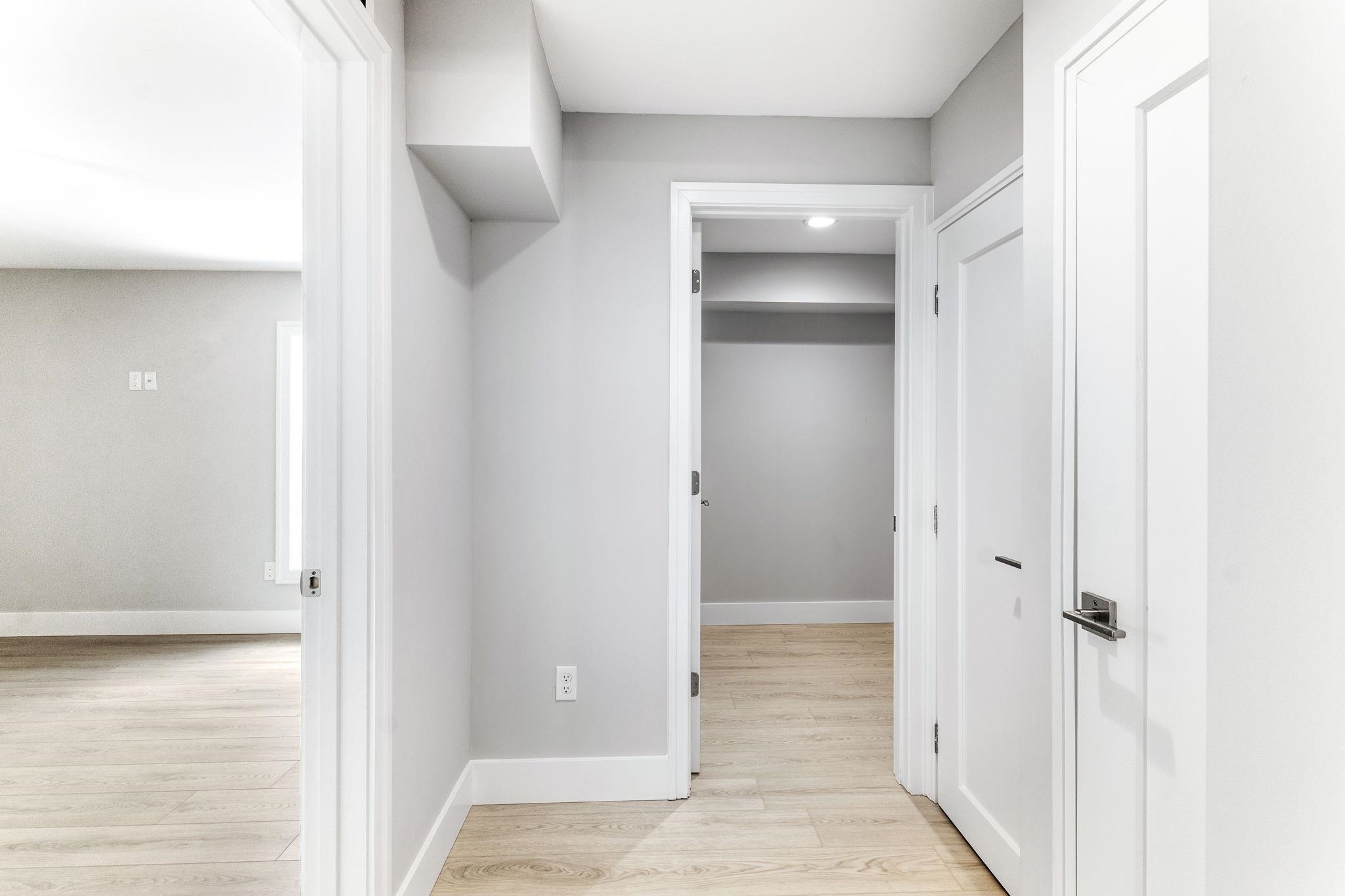 5348 Pelican Way St. Augustine, FL 32080 - Photo 25 of 46 a view of a hallway with a wooden floor