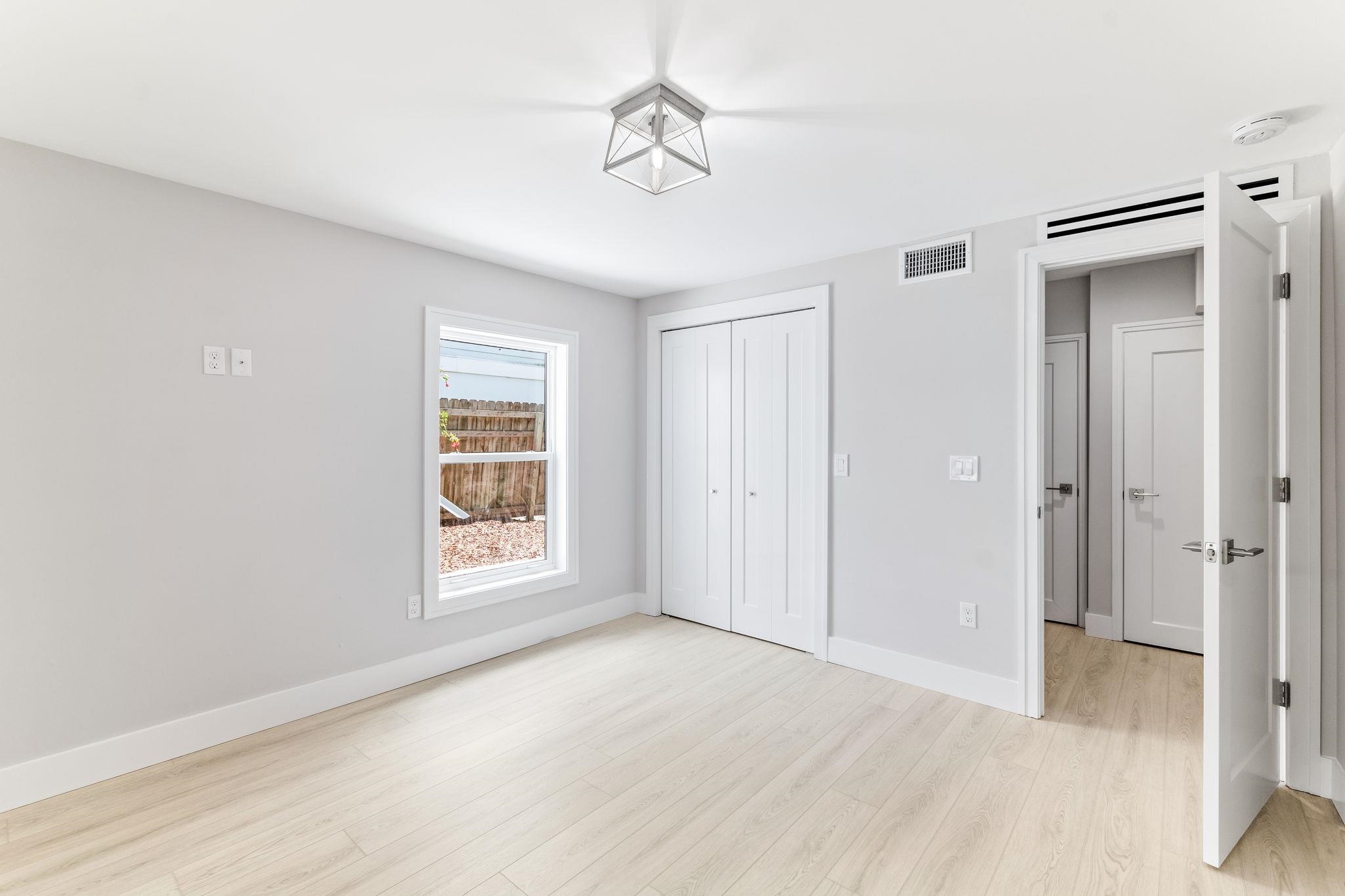 5348 Pelican Way St. Augustine, FL 32080 - Photo 28 of 46 a view of an empty room with a window