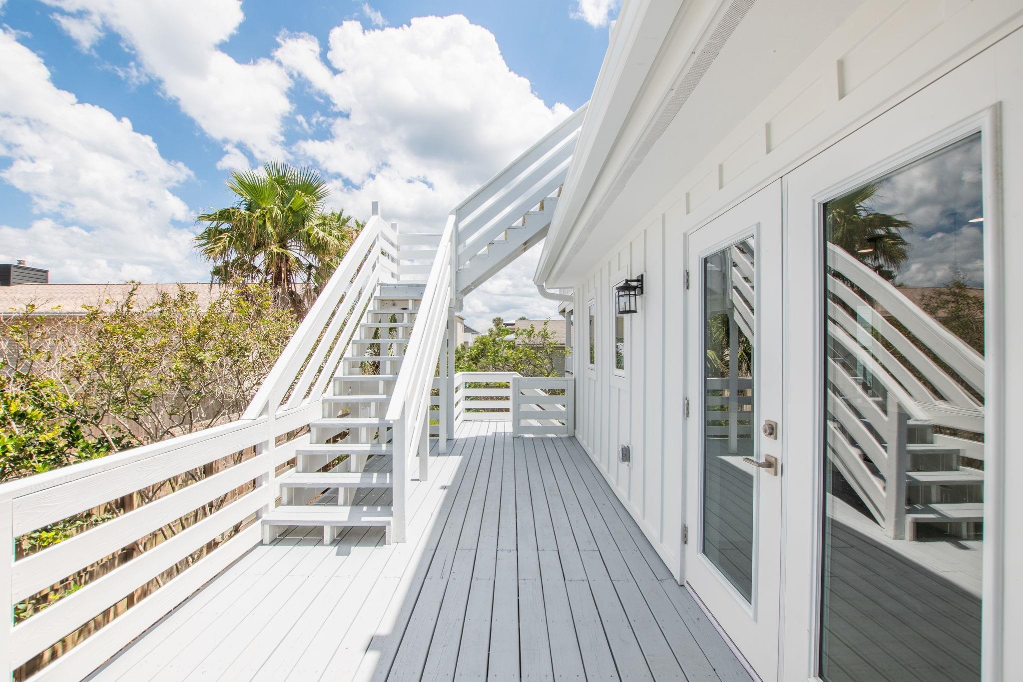 5348 Pelican Way St. Augustine, FL 32080 - Photo 32 of 46 a view of balcony with wooden floor