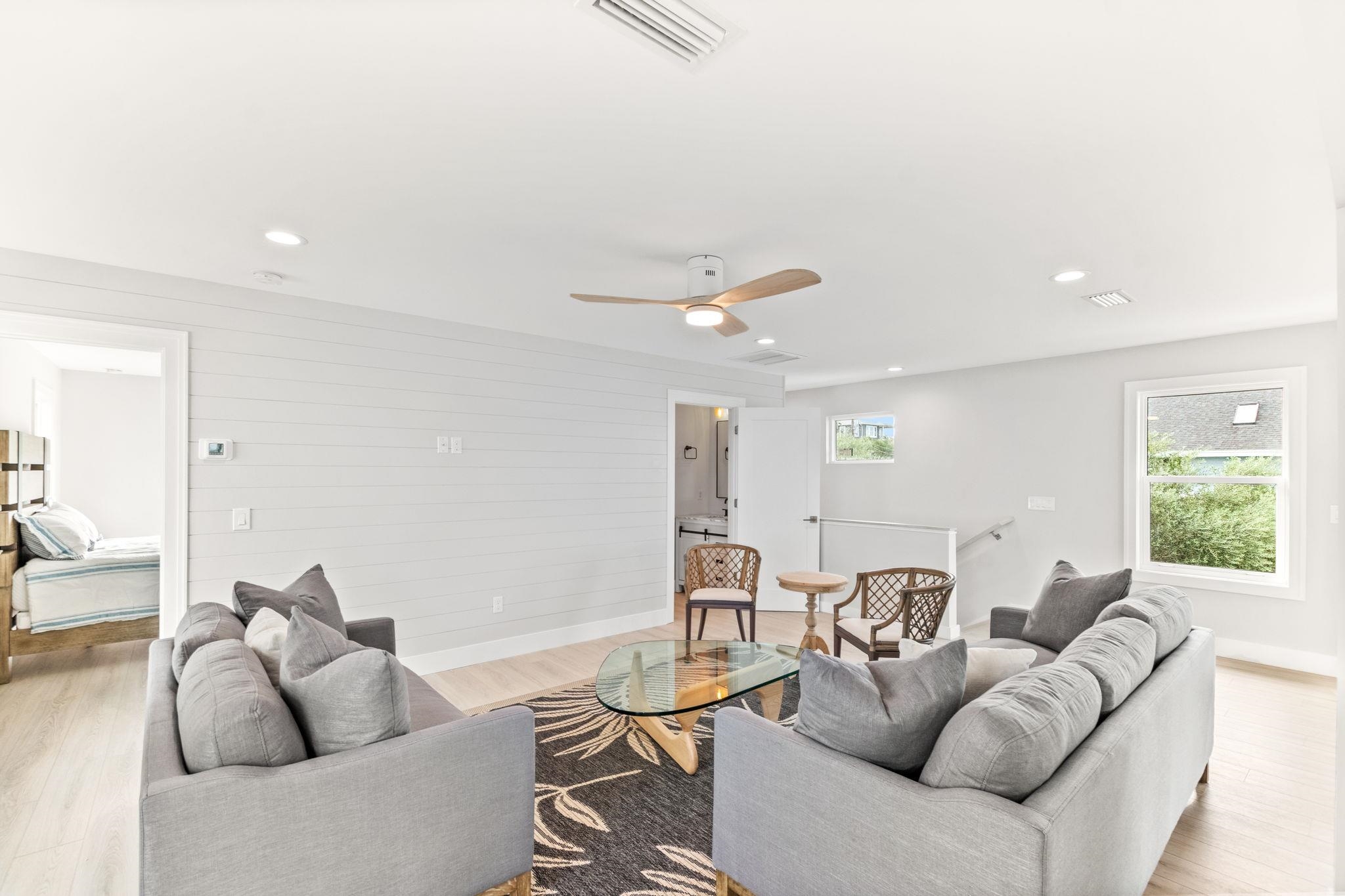 5348 Pelican Way St. Augustine, FL 32080 - Photo 6 of 46 a living room with furniture and a large window