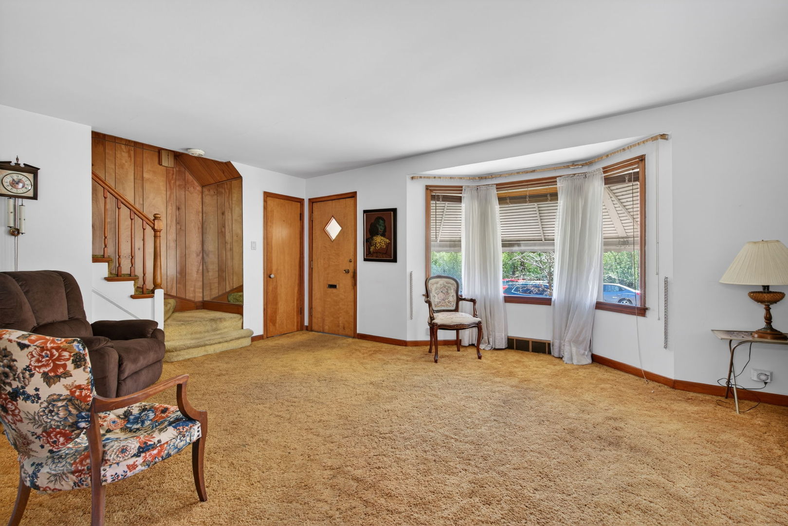 9020 West Forestview Drive North Riverside, IL 60546 - Photo 4 of 19 a living room with furniture and a window