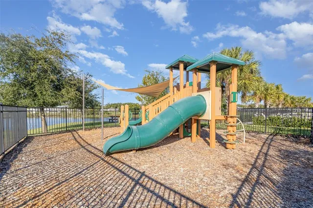 a view of a backyard with a patio