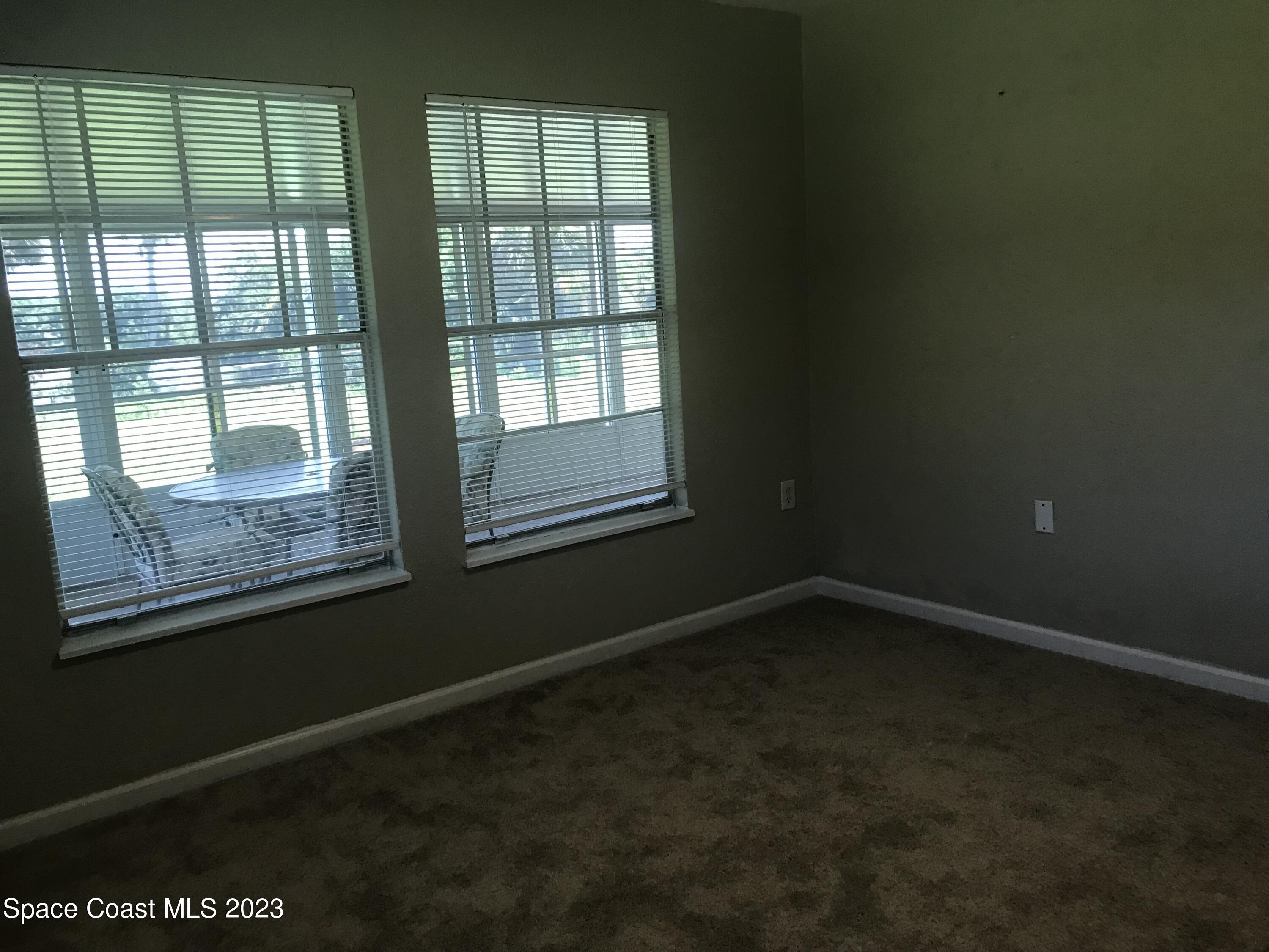 2525 Malabar Road Malabar, FL 32950 - Photo 15 of 30 a view of an empty room with a window